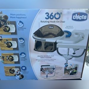 Chicco rotating hook on high chair. New in box. Never opened